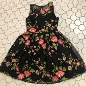 Girls size 8 Black formal dress with floral embroidery.